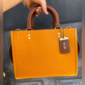 EUC Coach Rogue 25 Papaya Colorblock